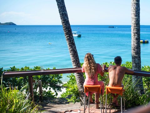 Couple drinking at the bar at Fitzroy Island