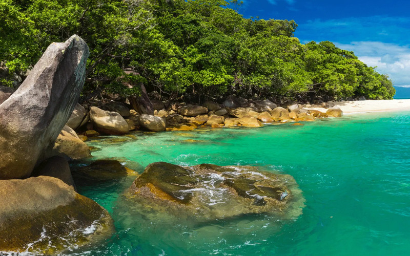 Nudey Beach at Fitzroy Island with granite boulders and clear turquoise water