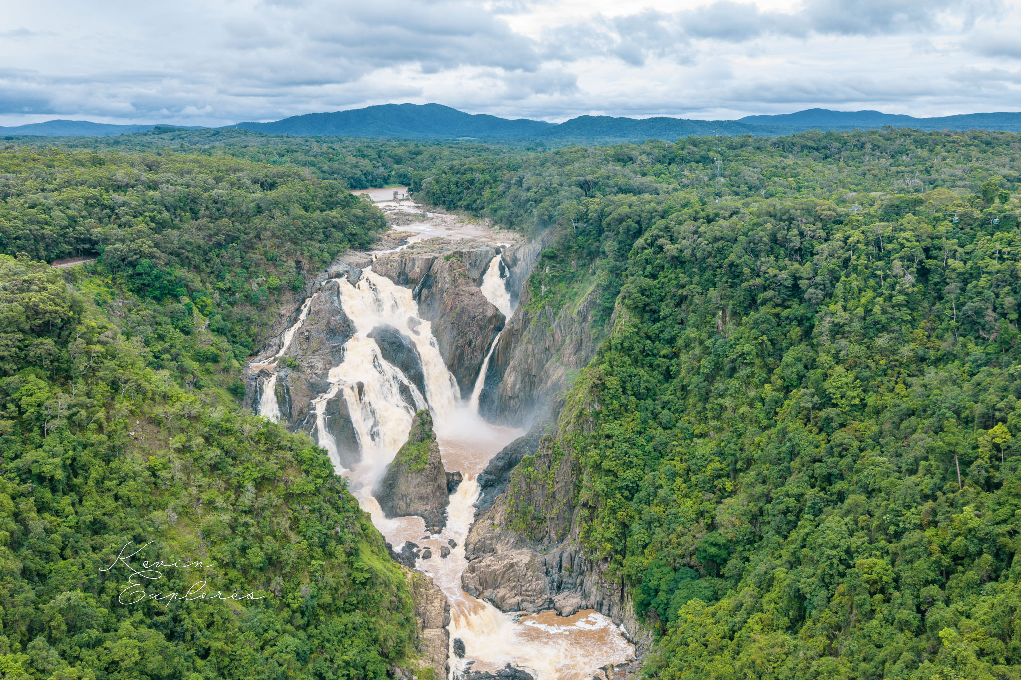Barron Falls cascading through Barron Gorge National Park rainforest near Kuranda Queensland