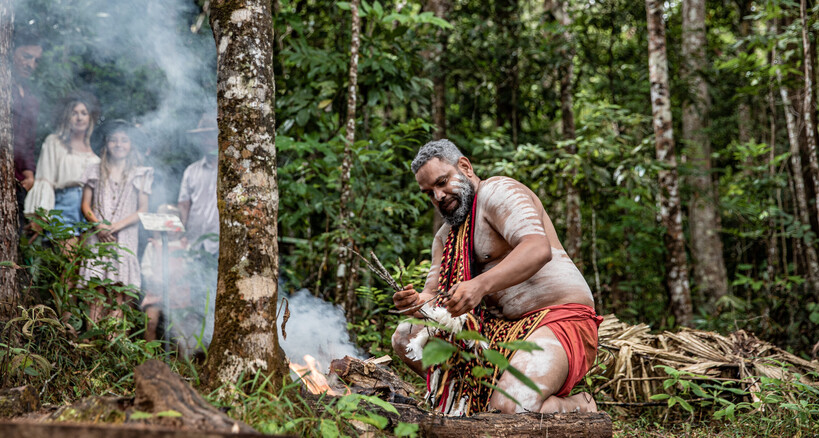 Aboriginal cultural fire demonstration for tourists at Rainforestation Nature Park Kuranda Queensland