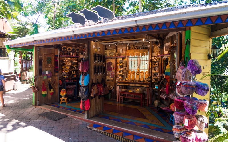 Kuranda Original Rainforest Markets colorful handicraft stall with local art and souvenirs Queensland